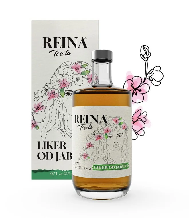 Boca likera sa cvjetnim motivima stoji ispred kutije u beloj pozadini. Tekst: "REINA Ti si ta LIKER OD JABUKE 0,7L alc. 22% vol. (v/v)."