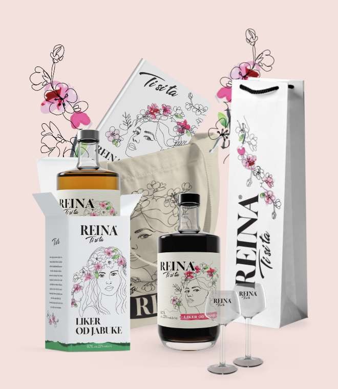 Boca i kutija nose ilustracije žena, cvijeća i natpise "REINA Ti Si Ta", u pozadini je čaša, torba i poklon vrećica.